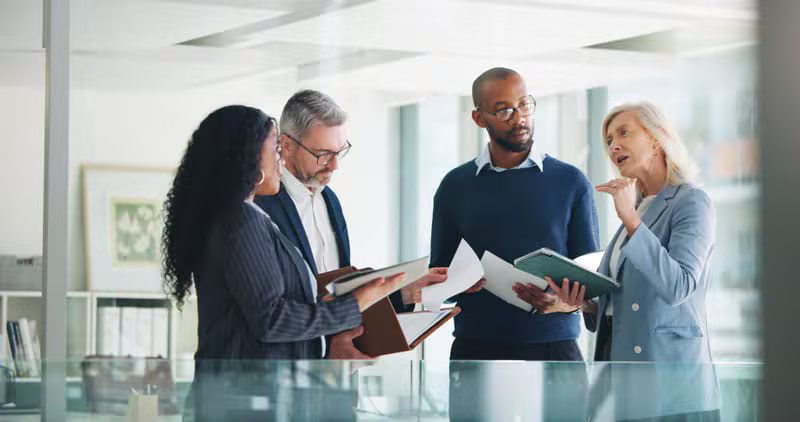 Corporate team collaborating and planning strategy